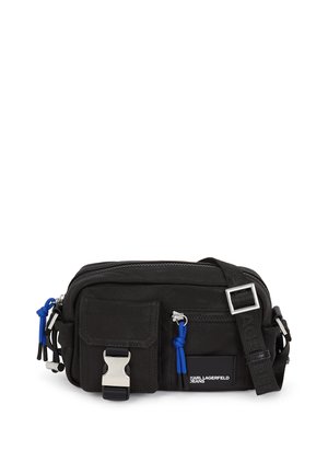 UTILITY BAG - Cross body bag - coated black denim