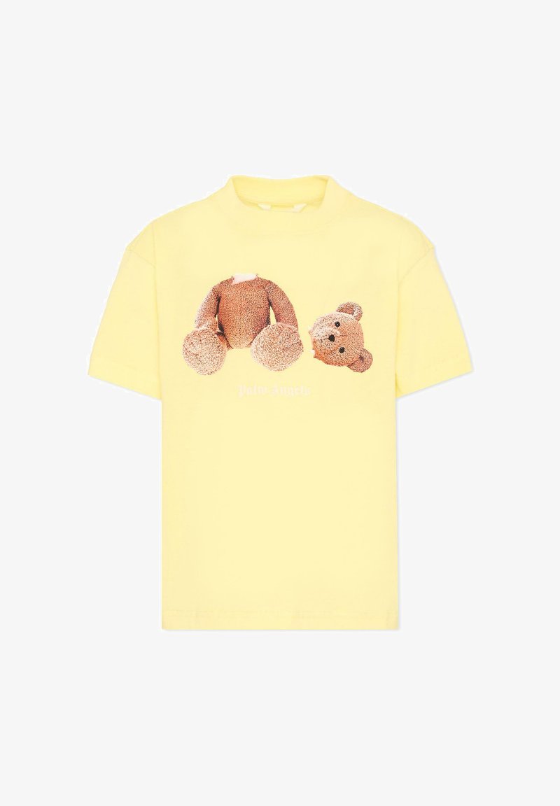 T-shirt jaune avec un dessin graphique d'un ours en peluche séparé en tête et corps au-dessus du texte « Palm Angels ».