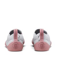 Pink-soled shoes with a grey fabric upper and a pink woven pull tab. Features a circular logo on the heel and minimalist design.