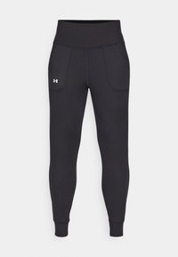 MOTION JOGGER - Tracksuit bottoms - black/white
