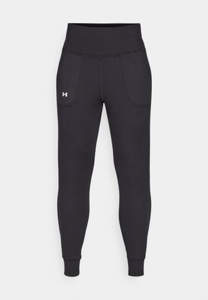 Black athletic leggings made from stretchy material, featuring a high waistband, side pockets, and fitted cuffs at the ankle.