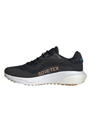 Black Gore-Tex running shoe with a textured upper, white midsole, and light brown outsole; features subtle branding accents.