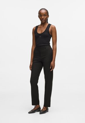 DAILY - Trousers - black
