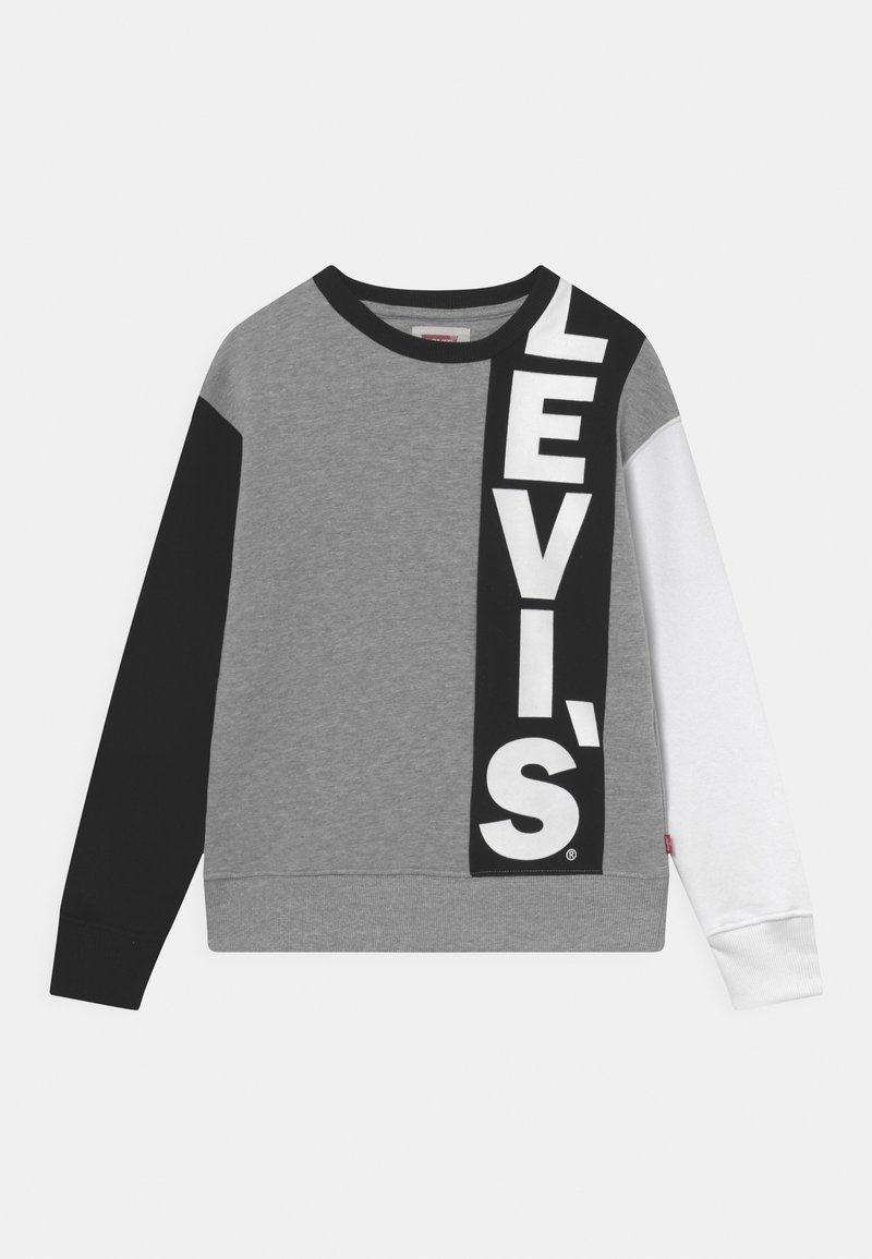 Sweat-shirt gris avec une manche gauche noire, une manche droite blanche et un panneau vertical noir à l'avant avec un grand texte blanc « LEVI'S ».