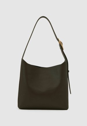 Tumerohelisest nahast õlakott siledat tekstuuri, kumerat ülaosa, reguleeritava rihma ja minimalistliku disainiga. Kulla toonis riistvara detailid.