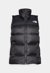 Svart vadderad ärmlös väst med hög krage, framtill dragkedja och två sidofickor. Har logotyp på övre vänstra sidan.