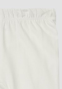 Weißer Stretchstoff mit einem elastischen Bund, glatter Textur und einem schlichten Design. Keine sichtbaren Muster oder Akzente.