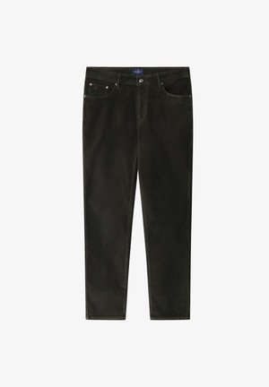 Ciemnozielone spodnie w prążki o slim fit, z pięcioma kieszeniami i subtelnymi detalami przeszycia. Jednolity kolor z gładką teksturą.