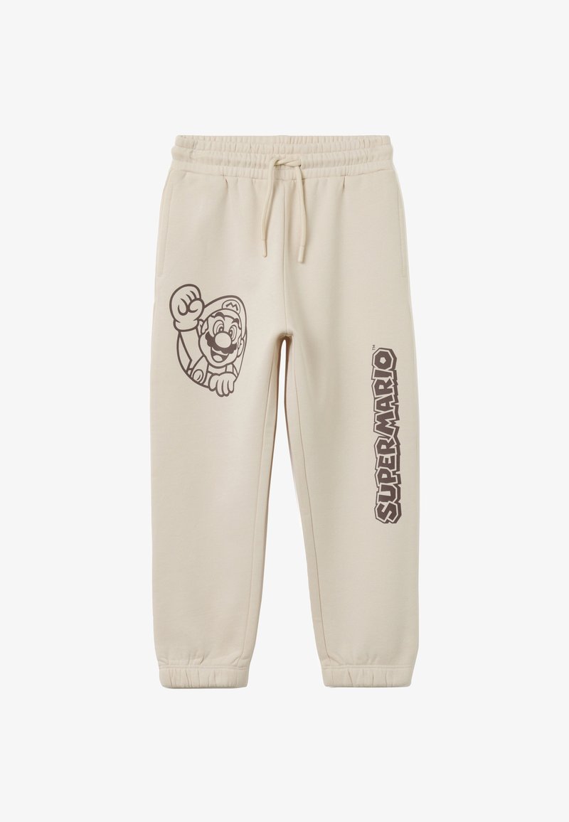 Beige sweatpants met een elastische tailleband en boorden. Op het linkerpantbeen staat een grafisch ontwerp van een personage en de tekst "SUPER MARIO" in donkerbruin.