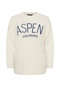 Pull crème, texture tricotée, col rond, épaules tombantes, "ASPEN COLORADO" brodé en bleu marine sur le devant.