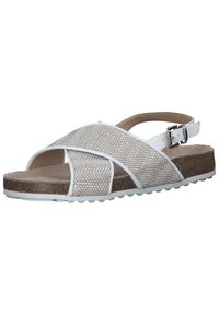 White slingback sandals featuring a woven upper with crisscross design, cork footbed, and textured rubber sole for grip.