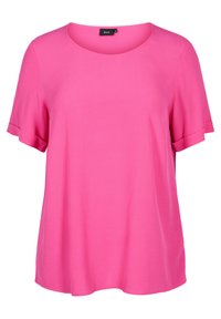 T-shirt rosa a maniche corte realizzata in tessuto morbido, con scollatura rotonda e risvolti, dal design comodo e largo.
