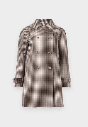 Manteau croisé à carreaux marron et blanc avec col large et poignets ceinturés, présenté sur un fond neutre.