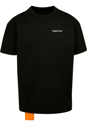 Black cotton t-shirt with short sleeves, featuring "forgotten faces" text in white. Includes an orange tag at the bottom left. Oversized fit.
