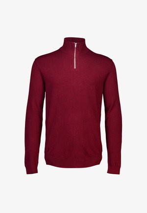Maglione rosso a maniche lunghe con colletto alto e una cerniera corta. Realizzato in materiale lavorato a maglia, presenta una texture liscia e un design aderente.