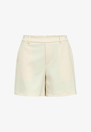 Gai bēša šorti, izgatavoti no gludas auduma, ar taisnu priekšpusi, jostas cilpām un nedaudz piegriezta piegriezuma. Tīrs, vienkāršs dizains bez redzamām rakstām.