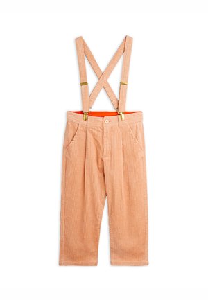 Peach-colored corduroy pants with front pockets and attached adjustable suspenders crossing at the back, displayed on white background.