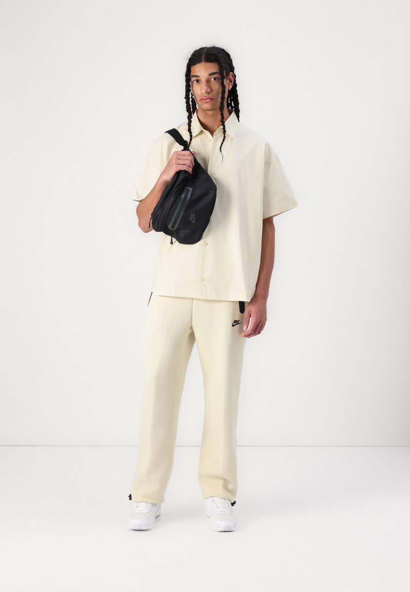 Nike Sportswear Trainingsbroek beige