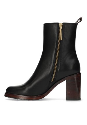 Black leather ankle boot with a gold zipper on the side, stacked wooden heel, rounded toe, and a smooth texture.