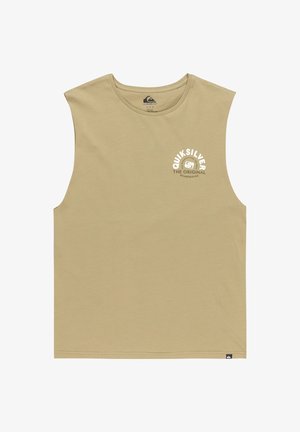 Béžová bezrukávová bavlnená košeľa s okrúhlym výstrihom. Na prednej strane má biele potlačené logo. Jednoduchý, uvoľnený strih.