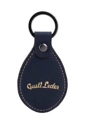 Mørkeblå lædernøglekæde med cremefarvet syning og guld "Guasti Leder" logo i midten, fastgjort til en rund metalnøglering.
