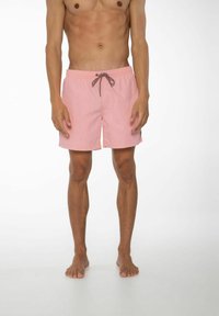 Lichtroze zwembroek met een elastische tailleband, verstelbaar trekkoord en zijzakken. Het stof lijkt lichtgewicht en glad.