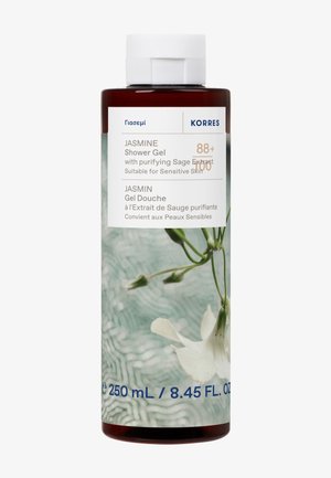 Flacon de 250 ml de gel douche jasmin Korres avec extrait de sauge purifiant, adapté aux peaux sensibles, étiqueté en anglais et en français.