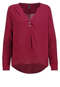 Blusa de manga larga color burdeos con escote en V, dos botones, pequeño pliegue debajo de los botones y dobladillo curvado.