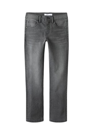 Dziecięce szare dżinsy o wąskim kroju z kieszeniami z przodu i z tyłu, szlufkami na pasek oraz zapięciem na guzik, metka z rozmiarem widoczna wewnątrz paska na talii.