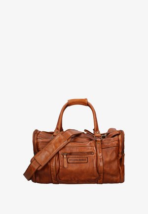 Brown leather duffel bag with dual handles and a detachable shoulder strap. Features multiple zippered pockets and a textured surface.