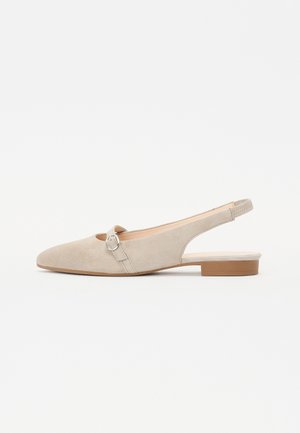 Beige suede slingback shoe with a pointed toe and a small buckle detail. Flat heel and slightly cut-out sides enhance breathability.
