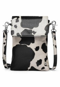 Cowhide crossbody bag with black and white spotted pattern, silver-toned hardware, adjustable strap, and a flap closure.