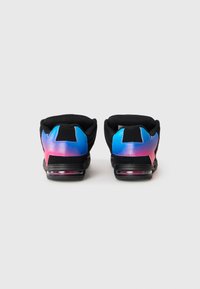 Black sneakers with gradient blue to pink heel accents and visible air cushion soles, shown from the back on a white background.