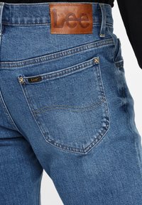 Lee RIDER - Slim fit jeans - dark blue
