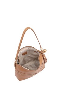 Sac à main en cuir tan avec une seule poignée, quincaillerie dorée, fermeture éclair et finition texturée. L'intérieur présente une doublure en tissu à motifs clairs.
