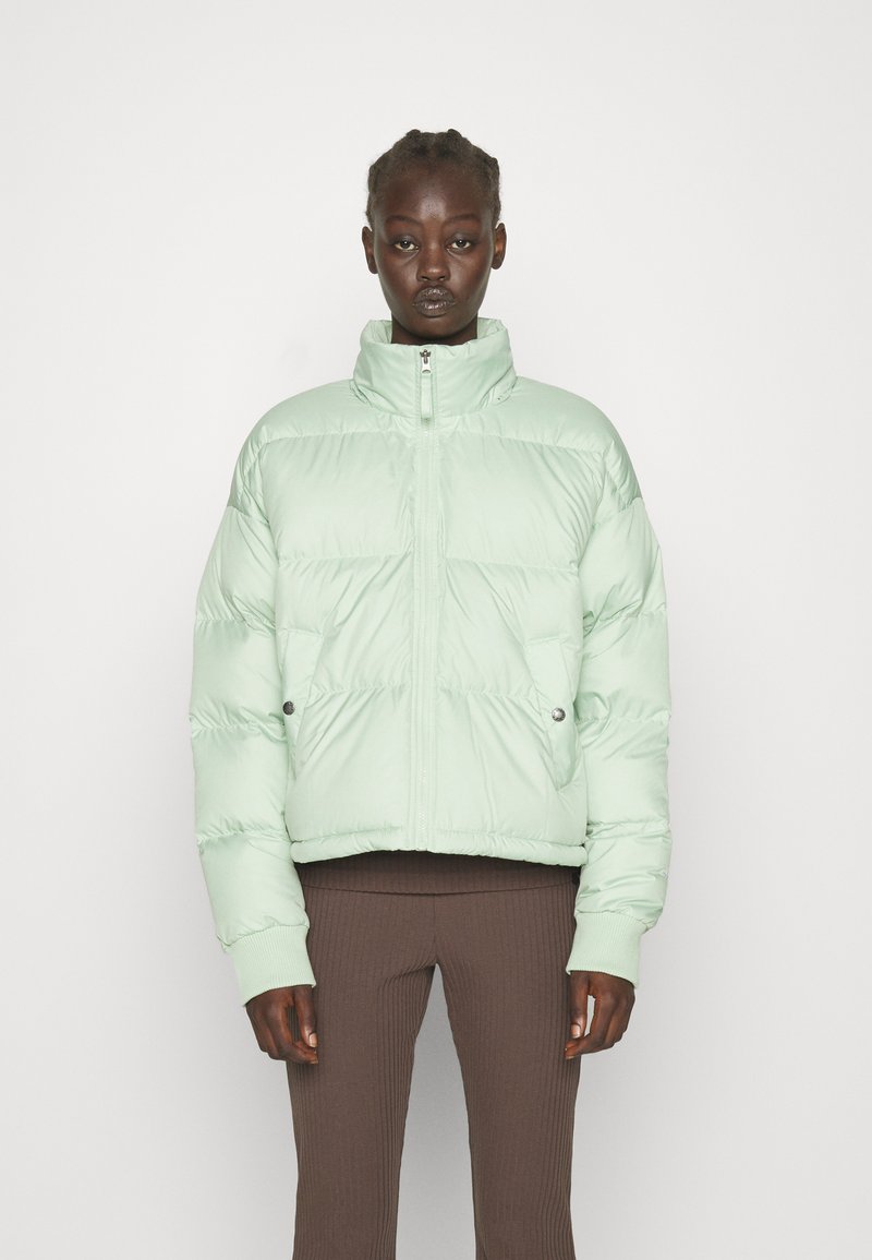 sage green north face puffer