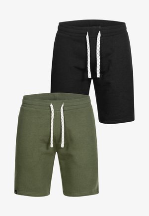 Zwei Paare legere Shorts mit weißen Kordeln, eines schwarz und eines olivgrün, vor weißem Hintergrund dargestellt.