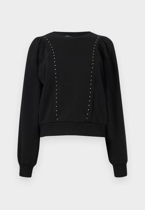 Schwarzer Pullover mit langen Ärmeln, gerippten Bündchen und Saum. Verfügt über dekorative silberne Nieten entlang der Vorderteile. Weicher, strukturierter Stoff.