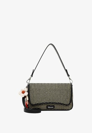 Sac à main à motif zigzag noir et beige avec bordure noire, bandoulière amovible et porte-clés fleur blanche attaché sur le côté.