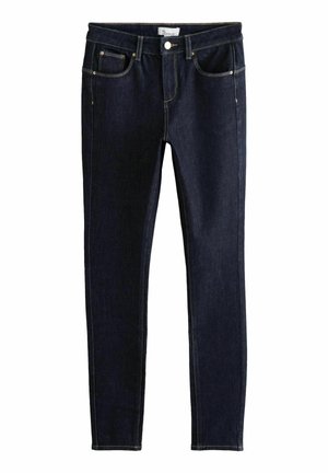 Tmavě modré skinny džíny z denimu, s předními kapsami, zlatým prošíváním a mírně texturovaným povrchem. Navrženy pro těsné padnutí.