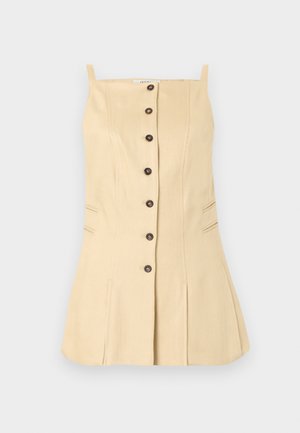 Abito beige senza maniche con sottili spalline, cuciture verticali, fila frontale di bottoni neri e leggera svasatura all'orlo.