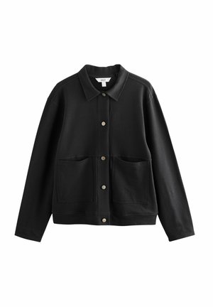 Veste noire à manches longues avec boutons, col large et deux poches plaquées devant, en tissu texturé.