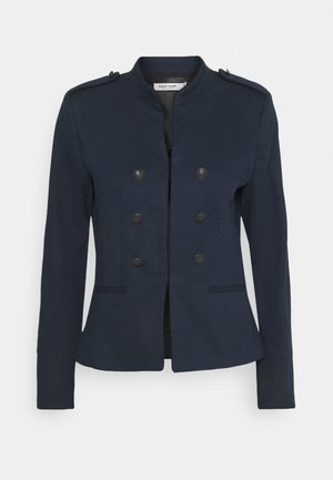 Navy blue women's blazer with stand collar, double-breasted black buttons, epaulets on shoulders, and two front slit pockets.