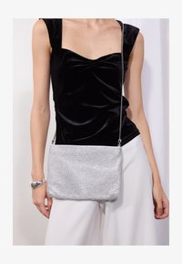 Επιλέχθηκε, silver-coloured