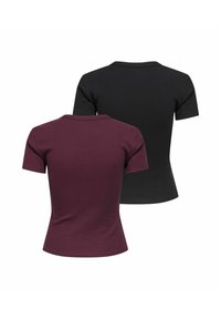 Deux hauts à manches courtes côtelés et ajustés vus de dos ; l'un en violet foncé et l'autre en noir, présentés sur un fond blanc.