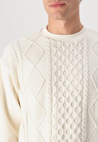 Carhartt WIP TRIDON mleczny