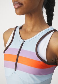 Puma LEMLEM COVERUP - Trikotaažkleit - icy blue