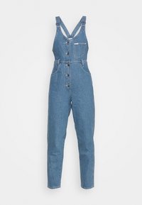 Denim overall med rak bendesign, justerbara axelremmar, framknappar, bröstficka och en ljusblå tvätt.