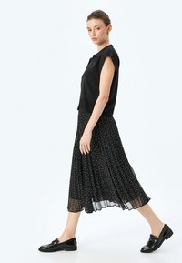Koton Falda acampanada - black
