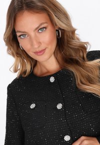 faina Bleizeris - black
